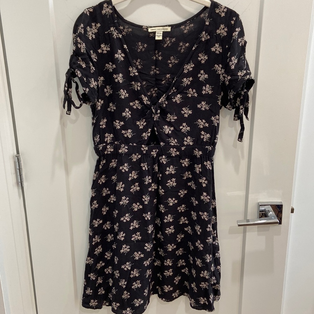 Black floral dress with cut out front and tie sleeves